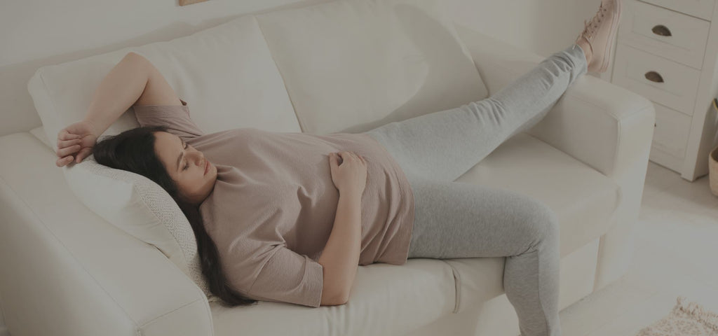 woman asleep in the middle of the day on her couch