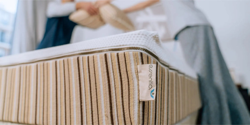 Close up of the corner of an Essentia mattress. The label is clearly visible in the middle.