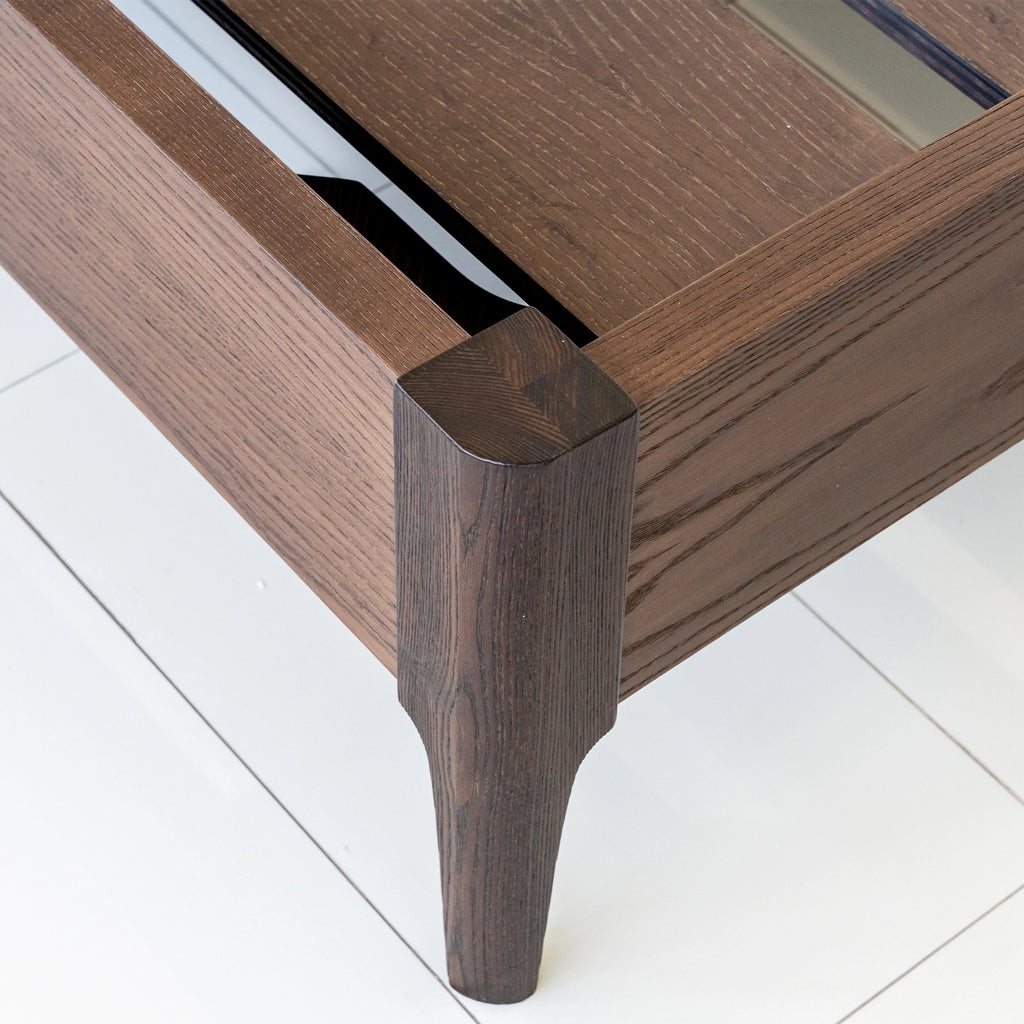 Close up of the corner leg of the Mesa wood bed frame