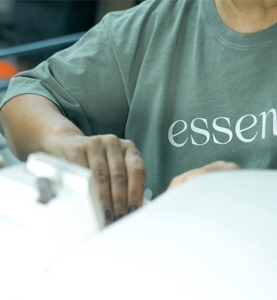 Essentia factory craftsman making a mattress.