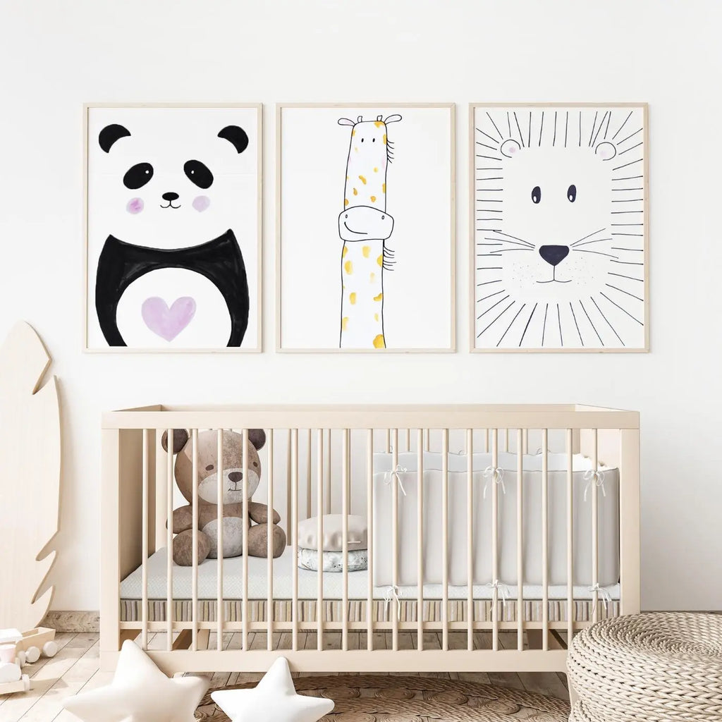 LaLa organic crib mattress in nursery with large animal artwork and stuffed animals in the crib