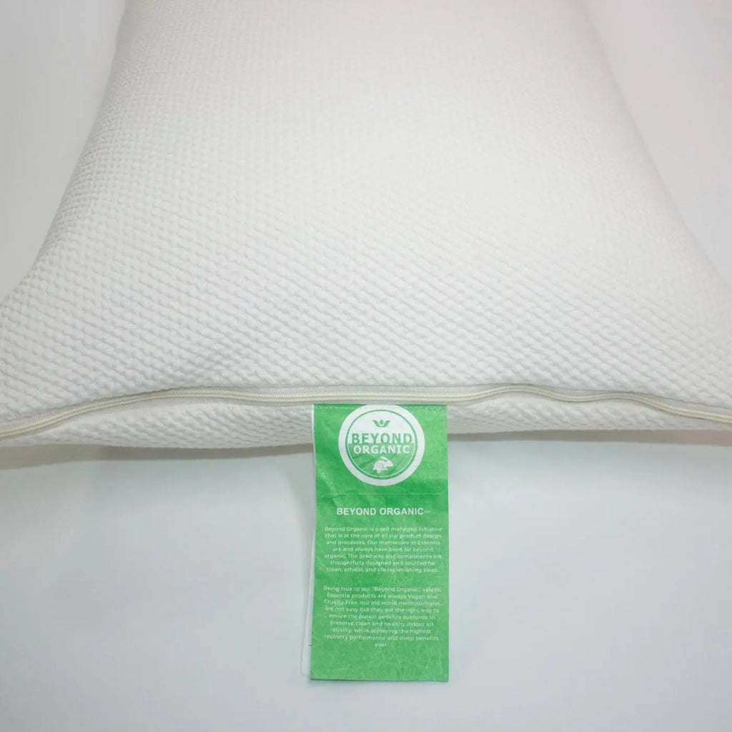 Essentia organic pillow shown with natural color cover with the Beyond Organic tag
